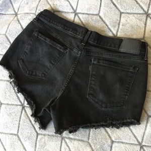 Levi’s 505 Black Denim Distressed Shorts